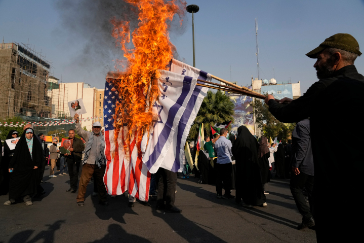 Iranian protesters burn Israeli and U.S. flags. The West’s approach to Iran’s belligerence has mostly been soft-diplomacy and appeasement, which have failed abysmally. The West would do well to learn from Israel that jihadists respond best not to coddling, but to military retaliation.